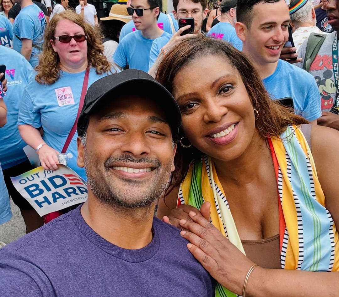 Attorney Daven Ghandi at the NYC Pride march, supporting LGBTQ and immigrant communities