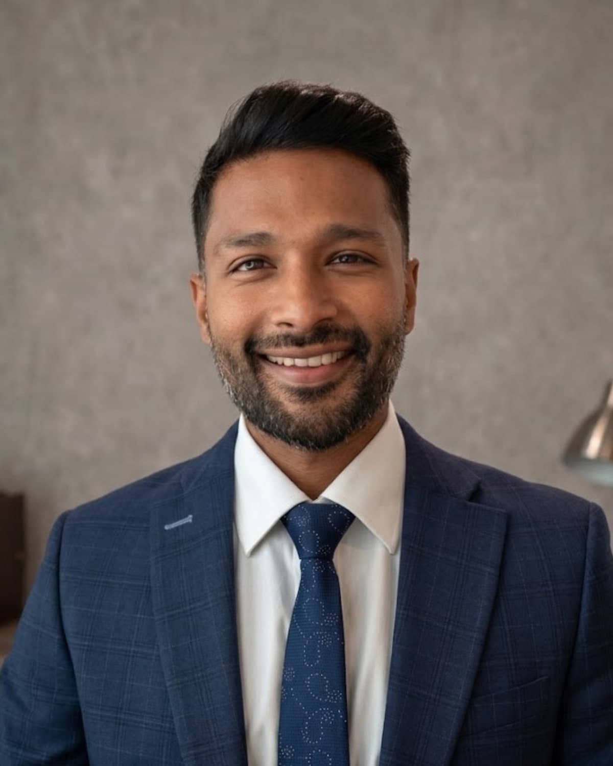 Portrait of attorney Daven Ghandi, founder of Kaza Law