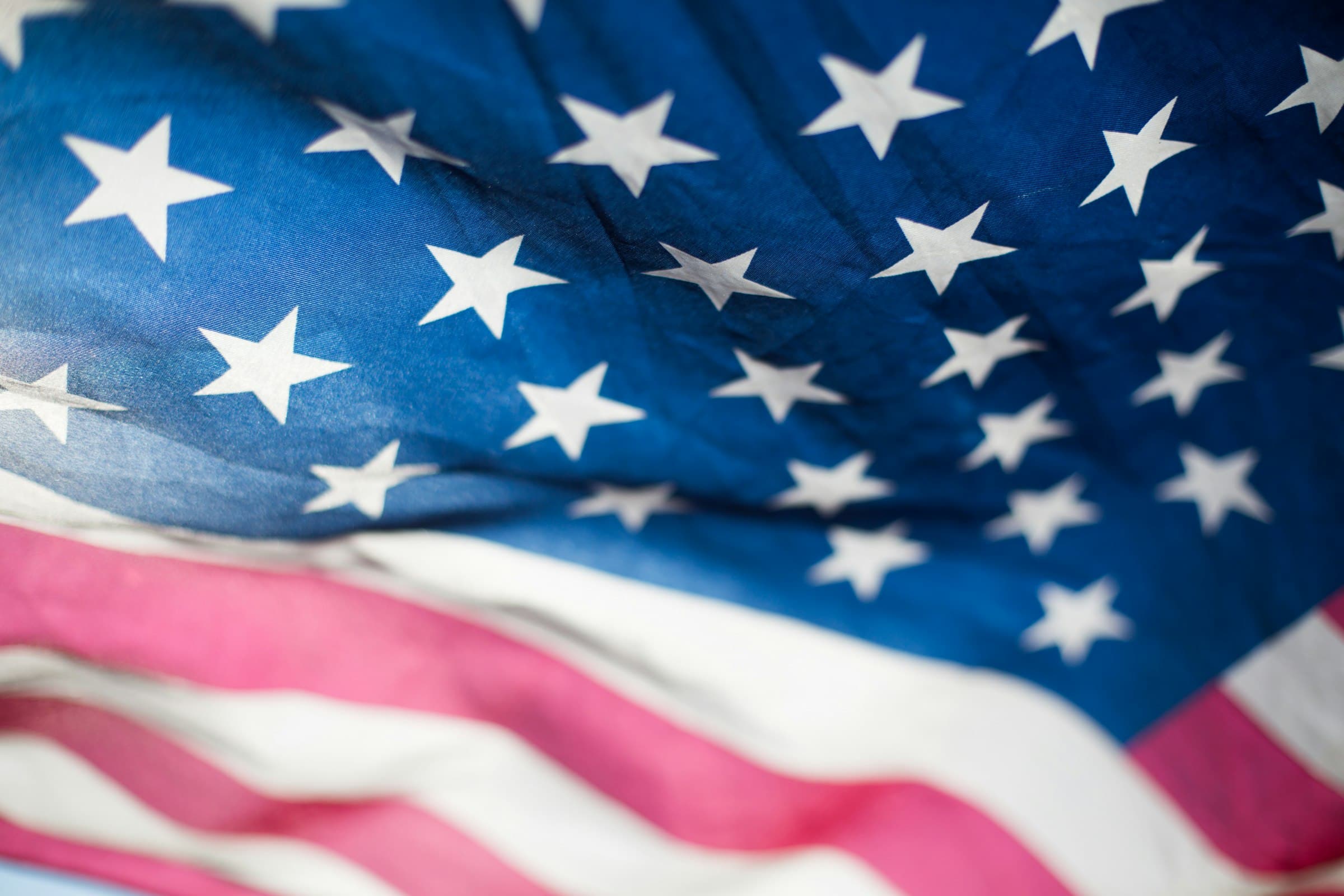 American flag rippling in soft cinematic light